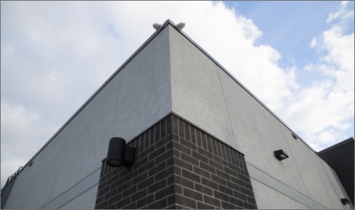 looking up corner of a building